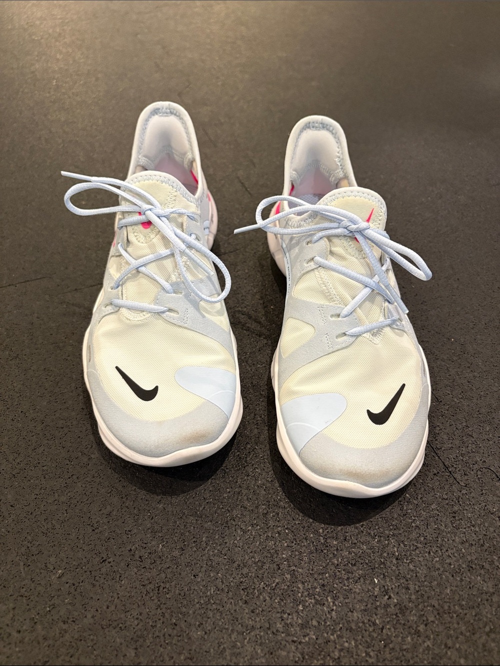 Nike White and Pink Athletic Sneakers with Black Swoosh